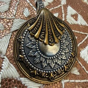 Elegant Gold and Silver Pendant Necklace